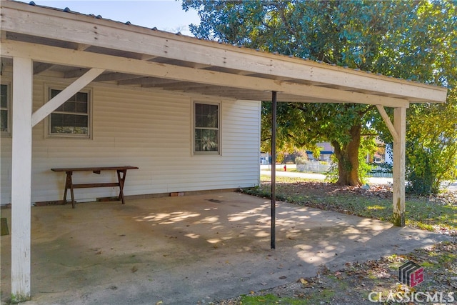 view of patio featuring a carport