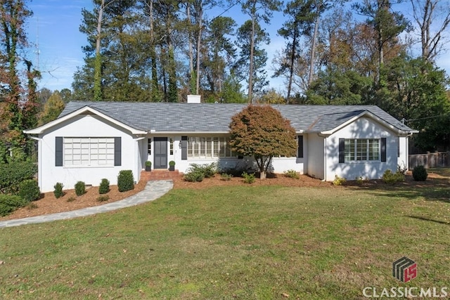 ranch-style house with a front lawn