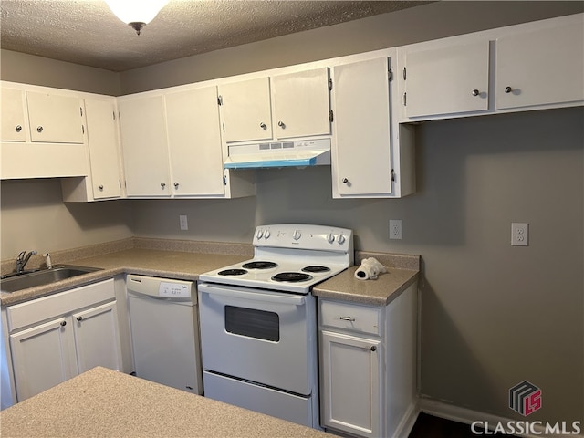 kitchen with a textured ceiling, white cabinetry, white appliances, and sink