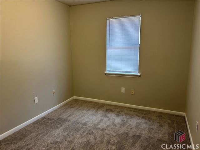 view of carpeted spare room