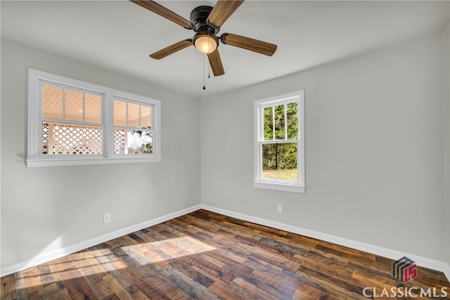 unfurnished room with ceiling fan and dark hardwood / wood-style floors