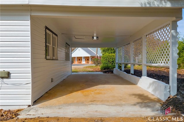 view of patio / terrace featuring a carport