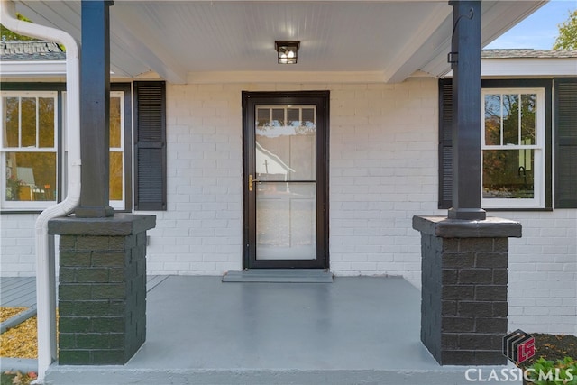 entrance to property with a porch