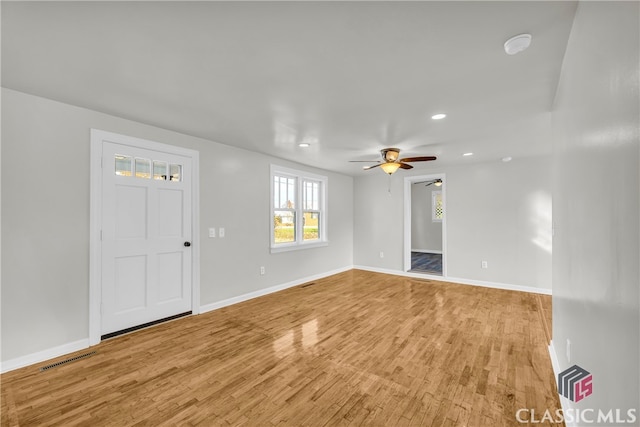 interior space featuring ceiling fan and light hardwood / wood-style flooring