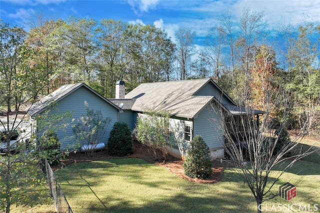 exterior space with a front lawn