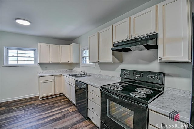 kitchen with white cabinetry, sink, black appliances, and dark hardwood / wood-style floors