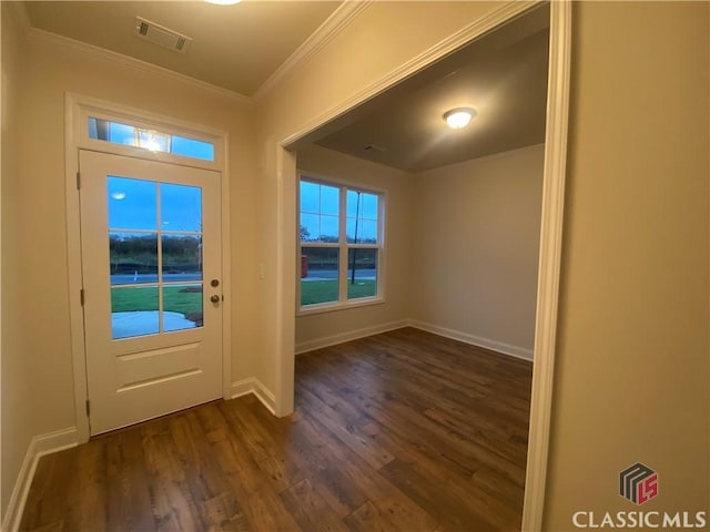 doorway to outside with dark wood-type flooring and ornamental molding