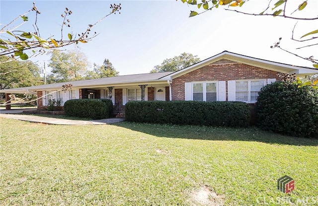 ranch-style house with a front lawn