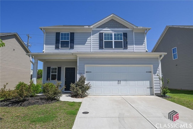 view of front of home with a garage