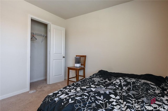 carpeted bedroom with a closet