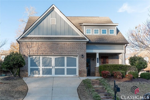 view of front of home with a garage