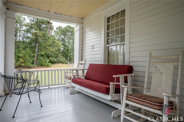 sunroom / solarium with wooden ceiling