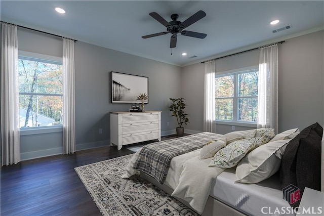 bedroom featuring dark wood-type flooring and ceiling fan