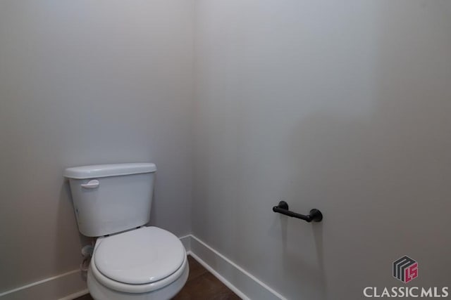 bathroom featuring toilet