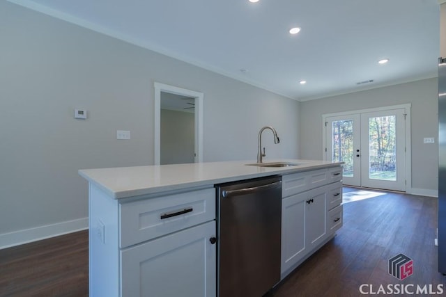 kitchen with sink, white cabinetry, dark hardwood / wood-style flooring, dishwasher, and a kitchen island with sink