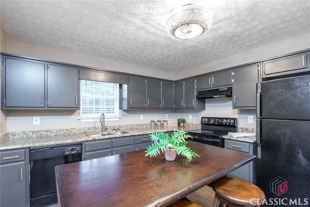 kitchen with black appliances, sink, gray cabinets, and a textured ceiling