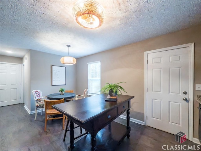 dining room with a textured ceiling