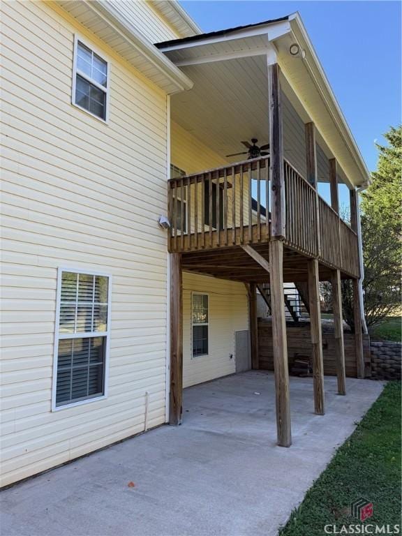 back of house with a patio area, ceiling fan, and a wooden deck