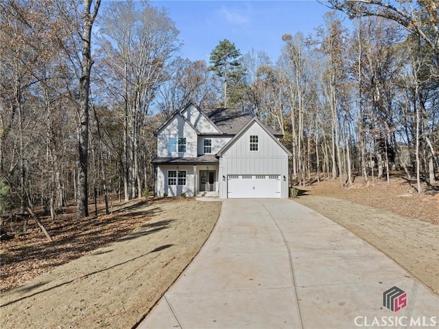 view of front of property with a garage