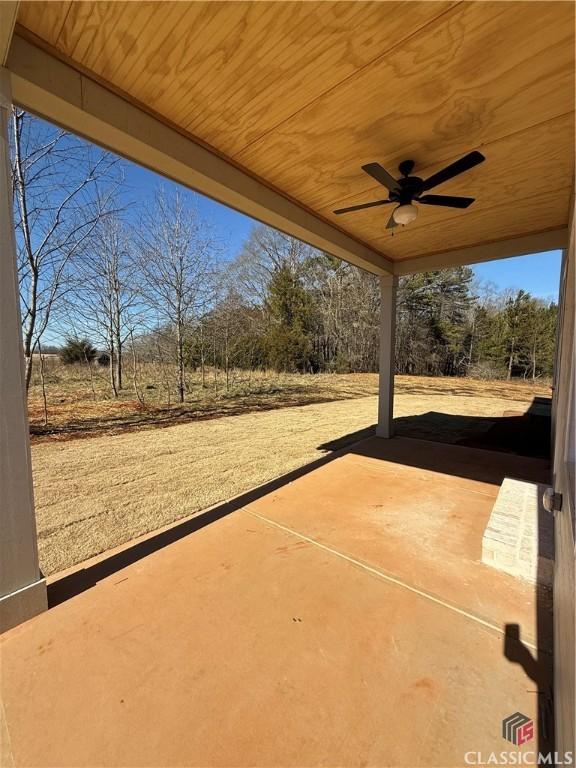 view of patio / terrace featuring ceiling fan