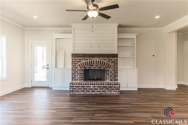 unfurnished living room with a fireplace, ornamental molding, dark hardwood / wood-style floors, and ceiling fan