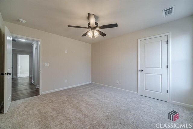 unfurnished room with carpet floors