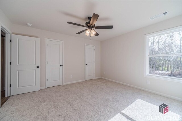 additional living space with lofted ceiling and carpet