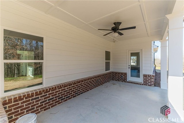 view of patio featuring ceiling fan