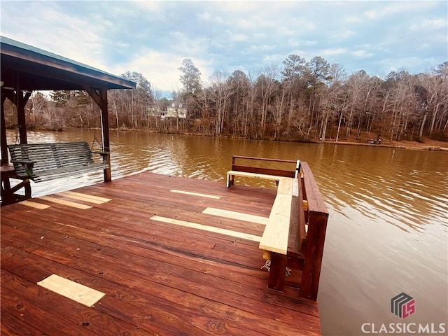 dock area with a water view