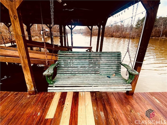 dock area with a water view