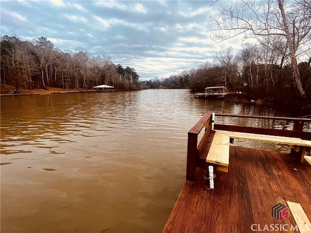 view of dock with a water view