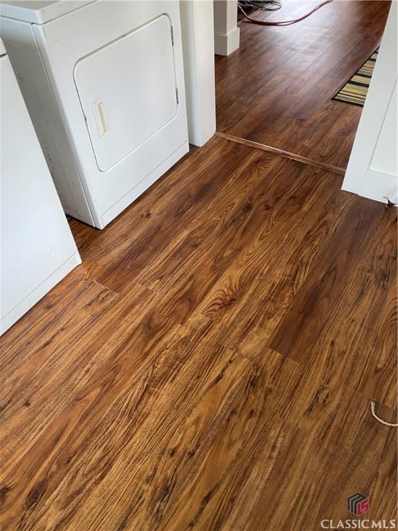 washroom featuring washer / dryer and hardwood / wood-style flooring