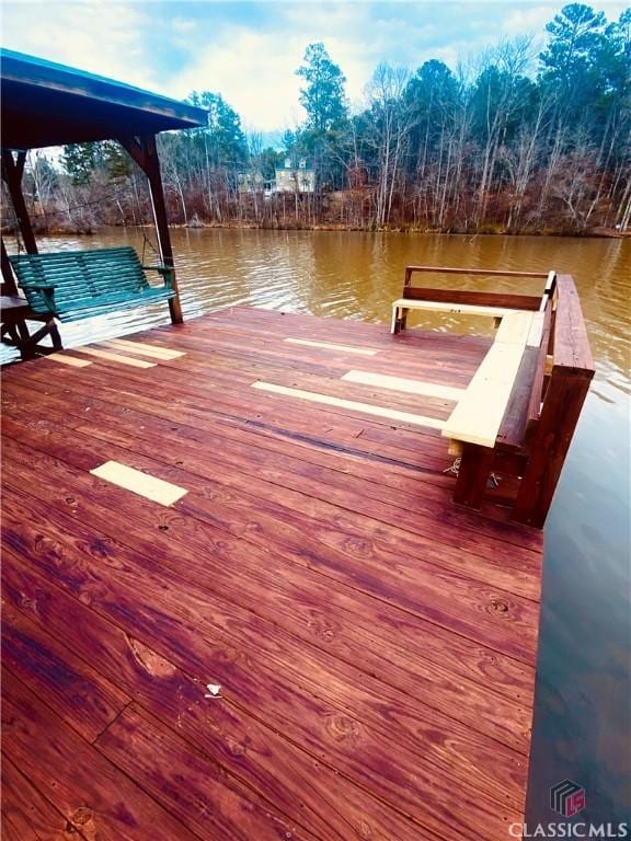 view of dock with a water view