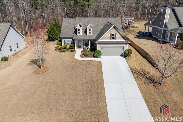 view of front of house featuring concrete driveway