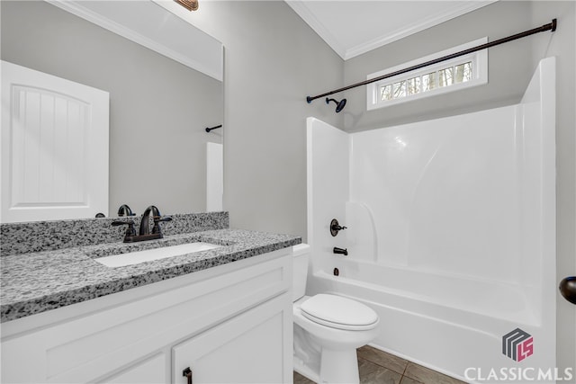 full bathroom featuring vanity, tile patterned floors, crown molding, shower / washtub combination, and toilet