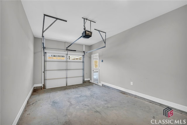 garage featuring a garage door opener