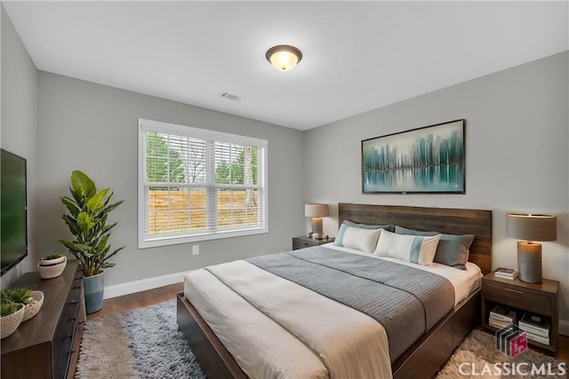 bedroom featuring hardwood / wood-style flooring