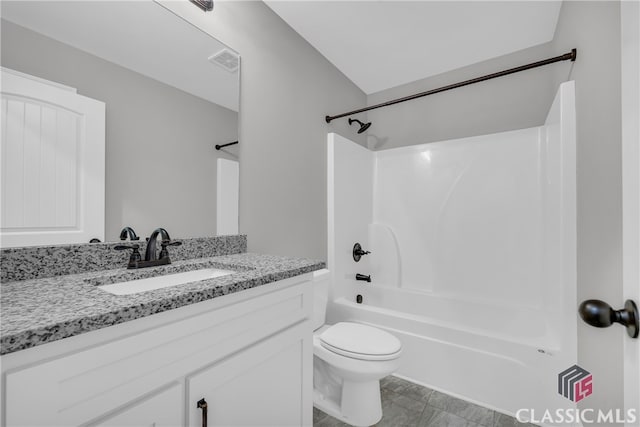 full bathroom featuring tile patterned flooring, vanity, toilet, and shower / washtub combination