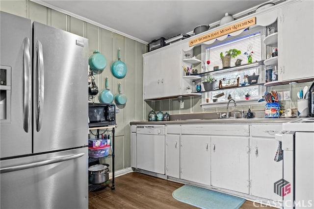 kitchen featuring white cabinets, dishwasher, dark hardwood / wood-style floors, and stainless steel refrigerator