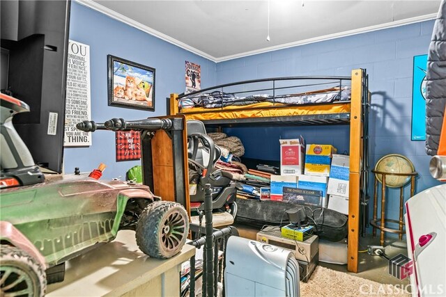 bedroom featuring ornamental molding