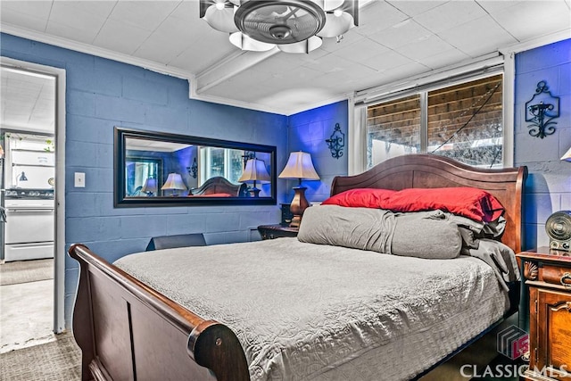 bedroom with crown molding