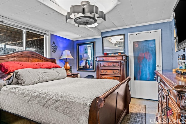 bedroom featuring crown molding