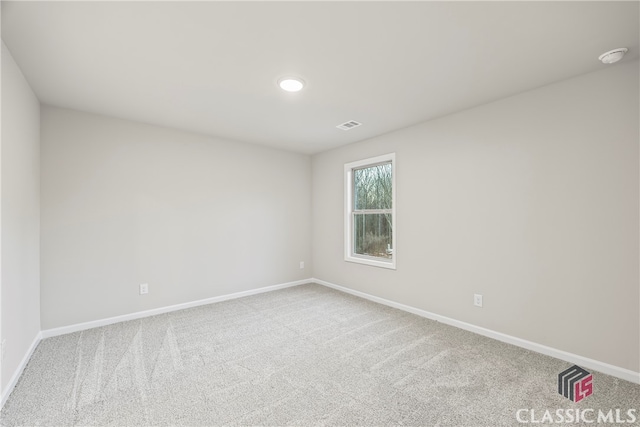 view of carpeted spare room