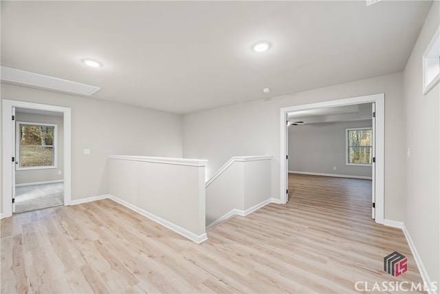 hallway featuring light hardwood / wood-style floors