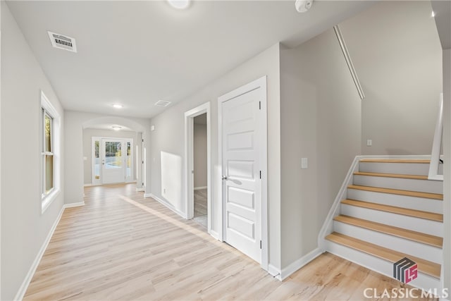 hallway featuring light hardwood / wood-style flooring