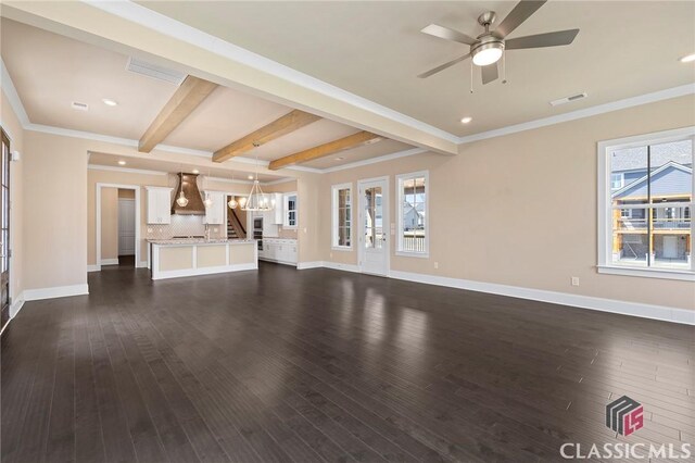 1745 Silo Bnd Unit 16, Watkinsville, GA 30677 - unfurnished living room featuring baseboards, plenty of natural light, and dark wood-type flooring