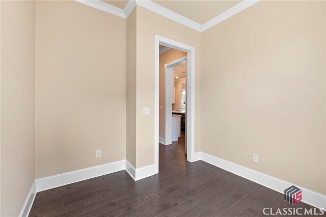 1745 Silo Bnd Unit 16, Watkinsville, GA 30677 - unfurnished room with dark wood-style floors, crown molding, and baseboards