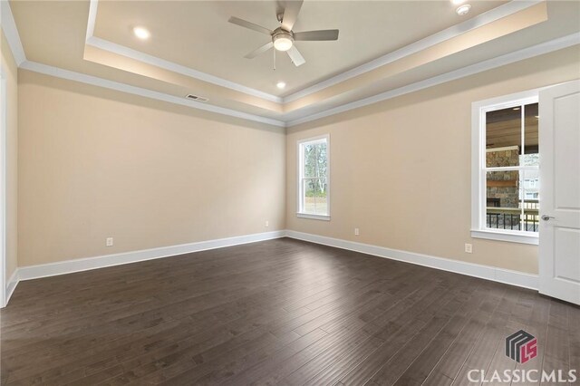 1745 Silo Bnd Unit 16, Watkinsville, GA 30677 - unfurnished room with a ceiling fan, visible vents, dark wood-style flooring, ornamental molding, and a raised ceiling
