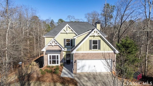 craftsman-style home with a garage