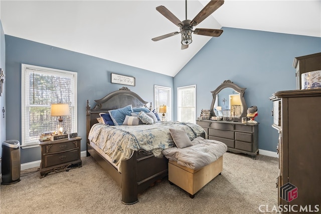 carpeted bedroom featuring ceiling fan and lofted ceiling